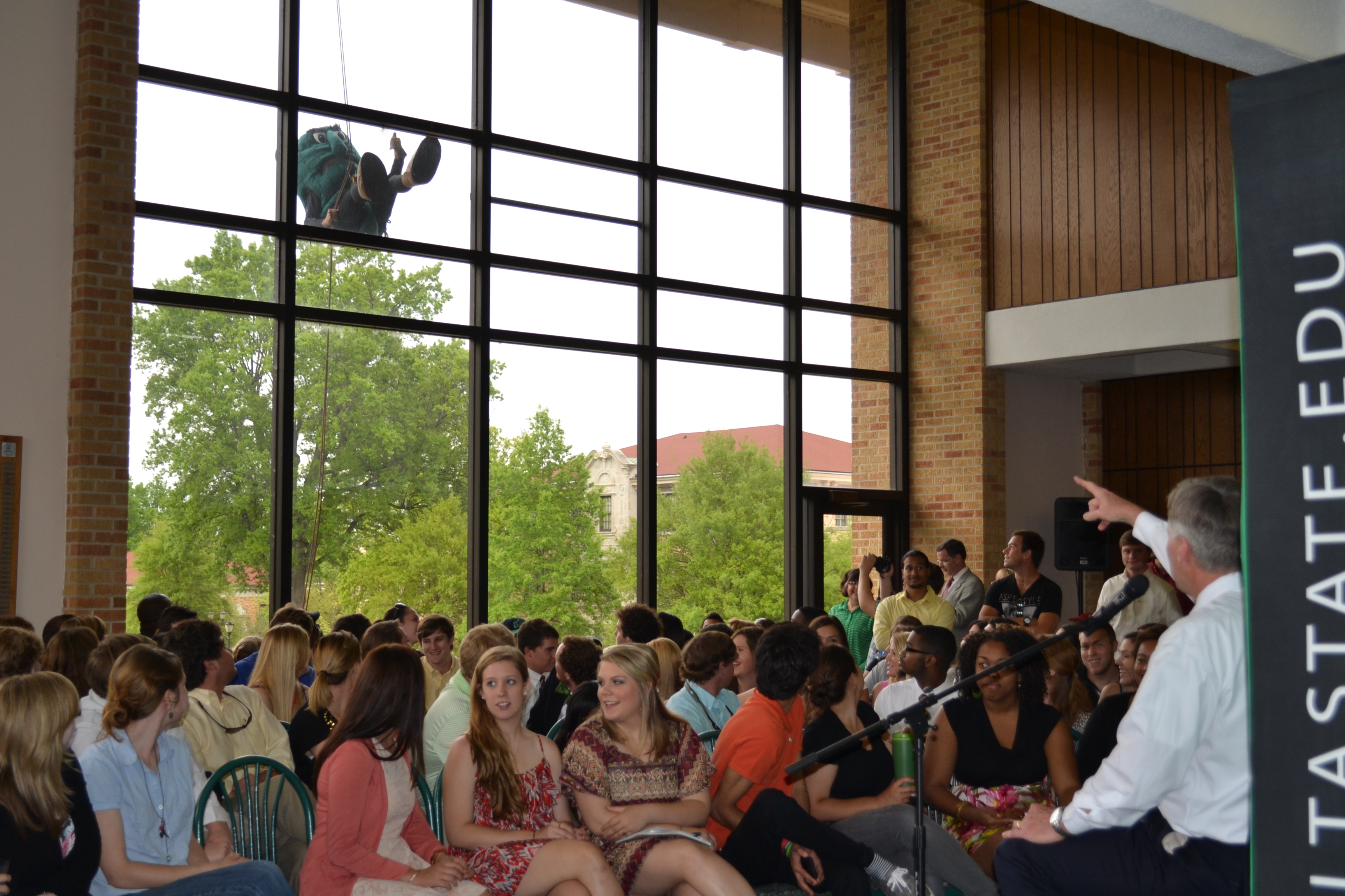 Delta State President William N. LaForge points as the Fighting Okra makes a grand entrance.